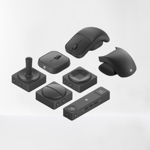 A close-up of accessories available from Microsoft Adaptive accessories, including a mouse with different handle options.